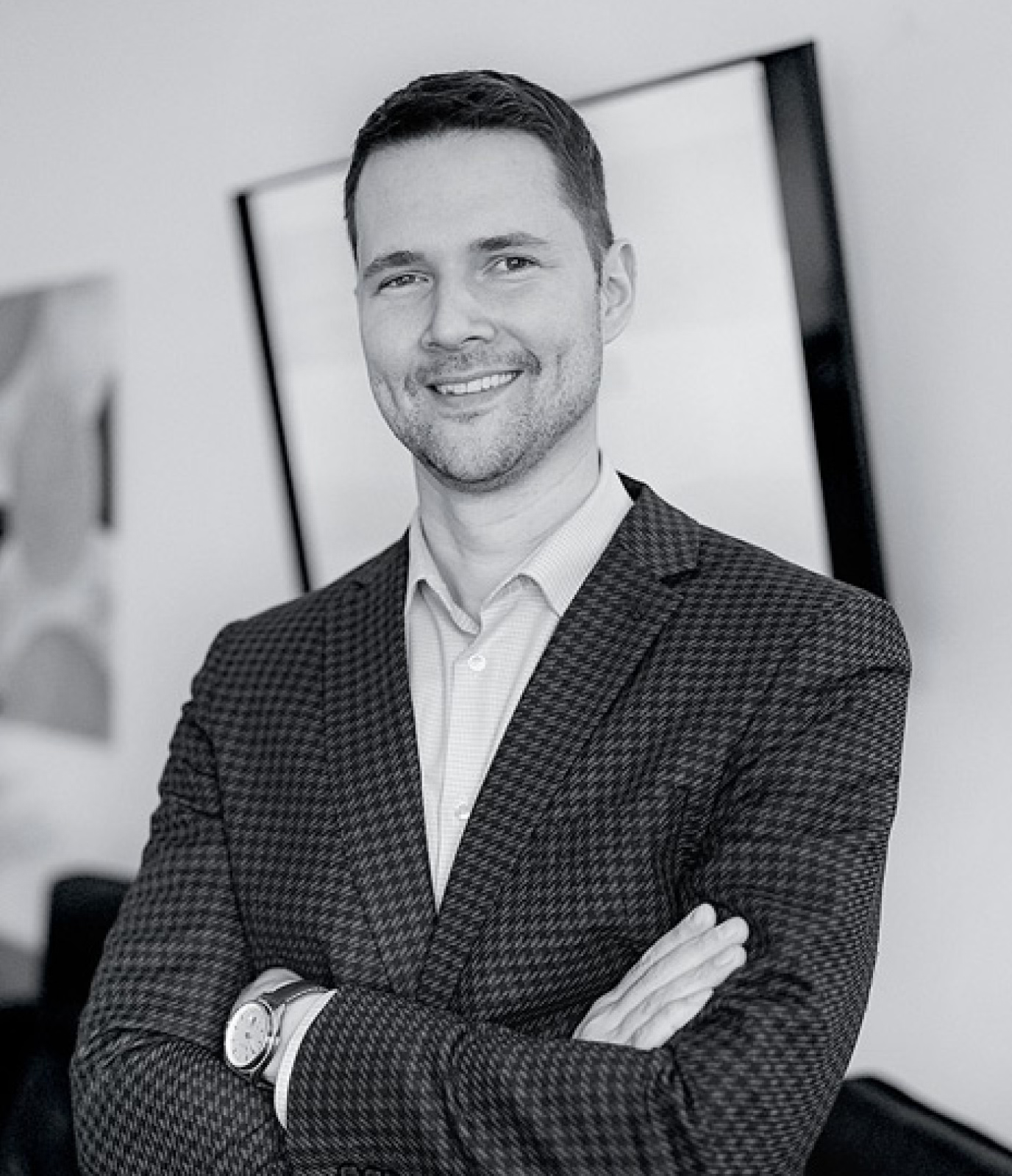 A image of a concrete sphere, balanced between two other larger spheres